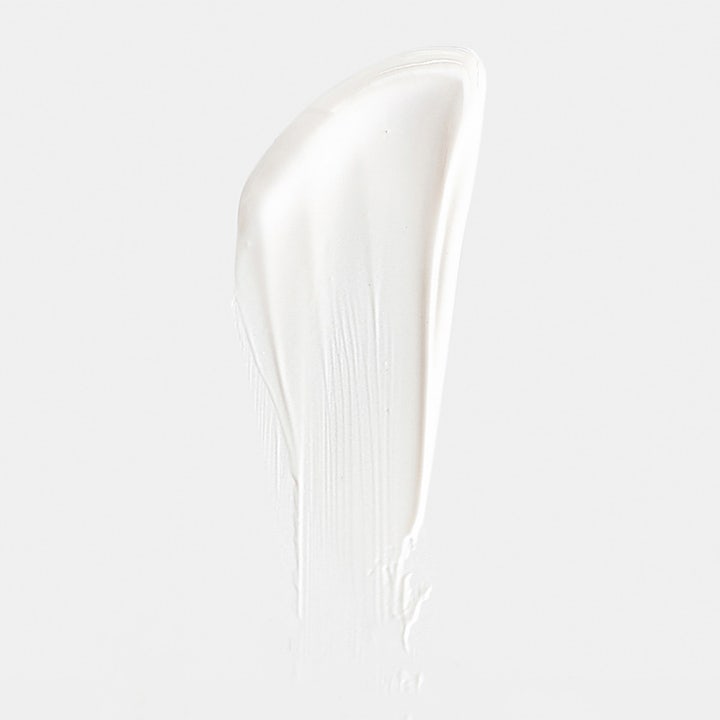 MÁDARA SUN30 Plant Stem Cell Antioxidant Sunscreen 100 ml solkrem med SPF30 i en hvit og kremet tekstur.