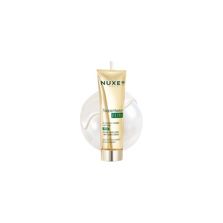 Nuxe Nuxuriance Ultra The Anti Dark Spot Cream 50 ml dagkrem med SPF30 og niacinamid i gulltube med hvit krem bak.