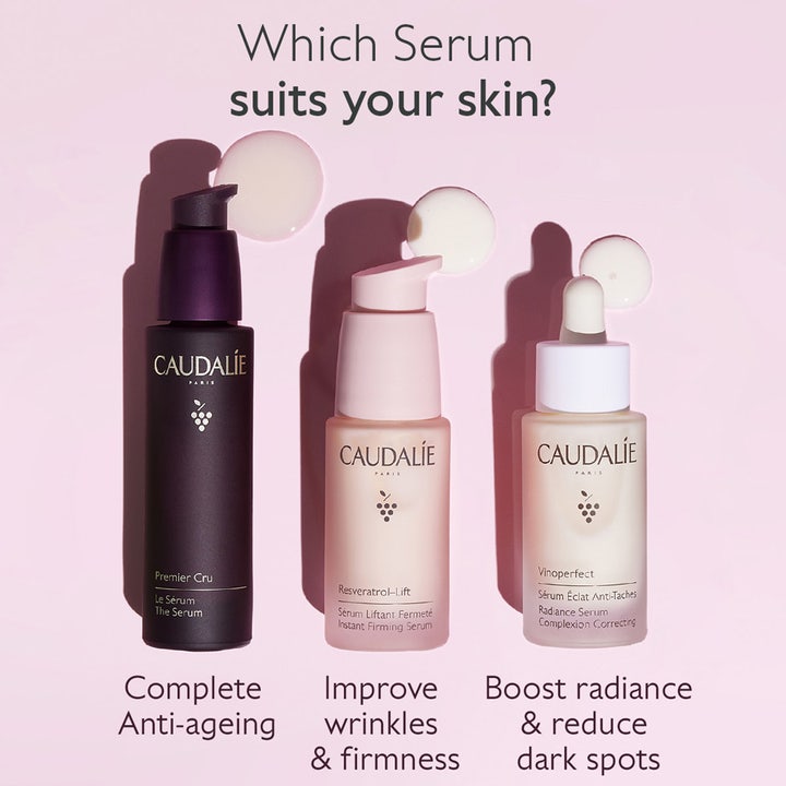 Caudalie The Serum 30 ml Premier Cru ansiktsserum mot aldring i lilla flaske ved siden av andre Caudalie serum
