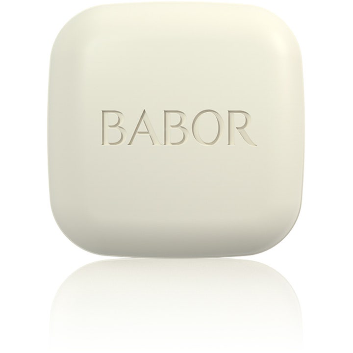 Babor Cleansing Bar ansiktsrens som gir ren hud i en kremhvit fast form med avrundede kanter og preget logo