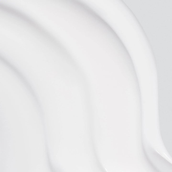 Dermalogica AGE smart Duo Skin Resurfacing Cleanser eksfolierende ansiktsrens med hvit kremet tekstur i myke bølger