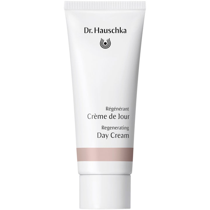 Dr. Hauschka Regenerating Day Cream regenererende ansiktskrem i hvit tube med en rosa stripe og hvit kork