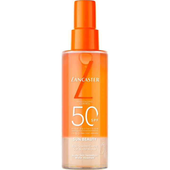 Lancaster Sun Beauty Sun Body Water SPF 50 solbeskyttelse motvirker aldring i en klar oransje sprayflaske