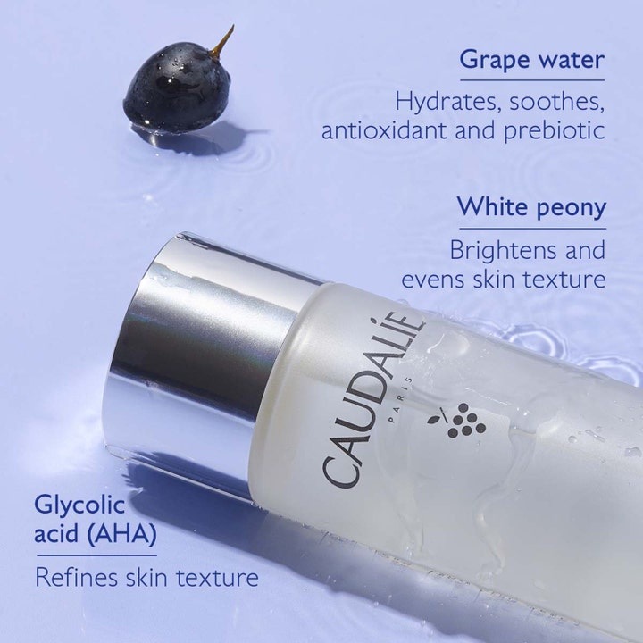 Caudalie Vinoperfect Concentrated Glycolic Essence 100 ml glødgivende essence med AHA i frostet glassflaske og vann