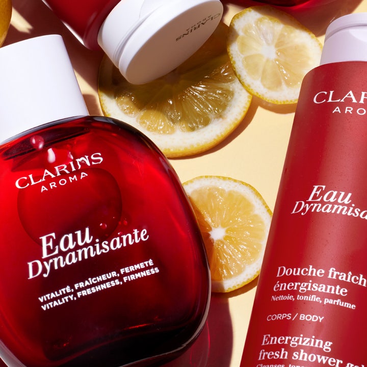 Clarins Eau Dynamisante Energizing Fresh Shower Gel 200 ml oppfriskende dusjsåpe i røde flasker med sitronskiver