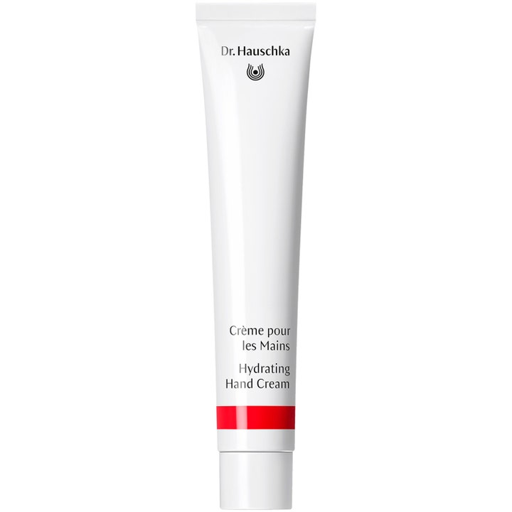 Dr. Hauschka Hydrating Hand Cream fuktighetsgivende håndkrem i hvit tube med rød stripe og hvitt lokk