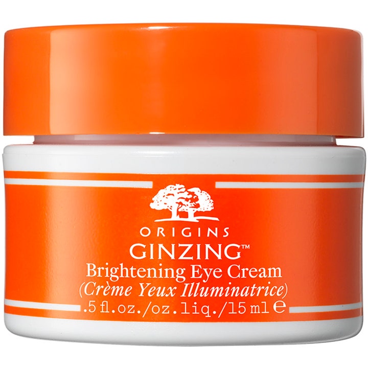 Origins GinZing 15 ml opplysende øyekrem mot mørke ringer i hvit krukke med oransje lokk og etikett