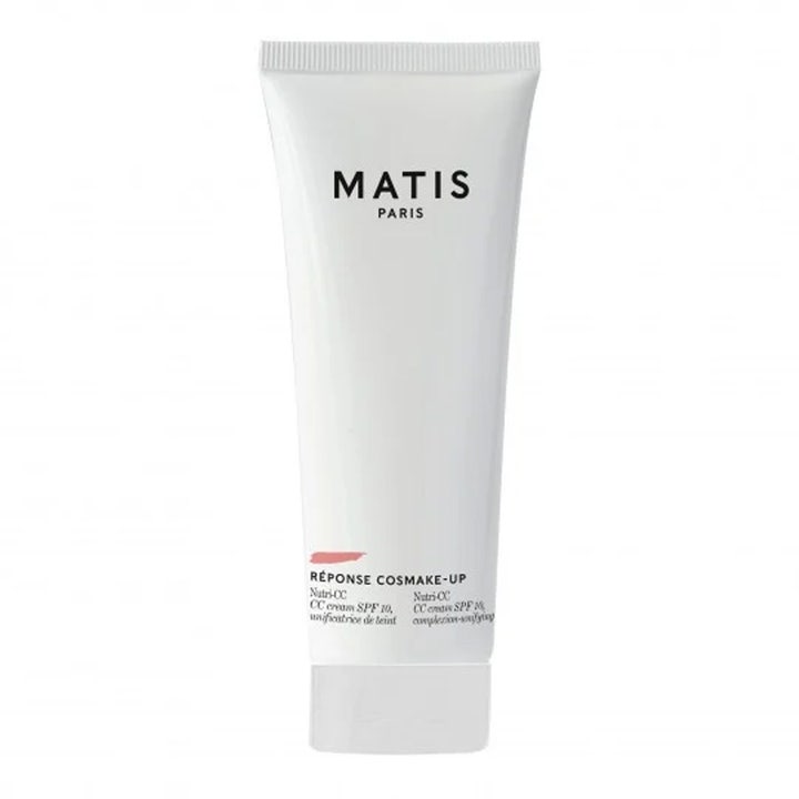 Matis Réponse Cosmake-Up Nutri-CC 50ml utjevnende CC-krem med SPF 10 i hvit tube med et lite rosa penselstrøk.