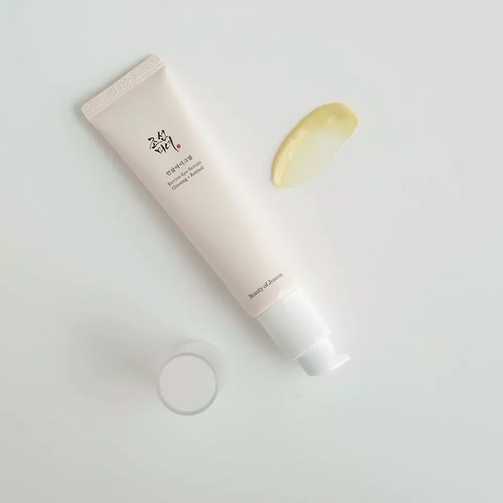 Beauty of Joseon Revive Eye Serum med ginseng og retinal i beige tube med pumpe og gul kremtekstur