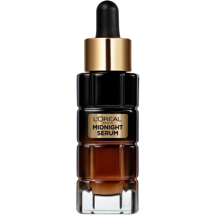 L'Oréal Paris Midnight Serum 30 ml glødgivende ansiktsserum i mørk riflet glassflaske med pipette og gulldetaljer.