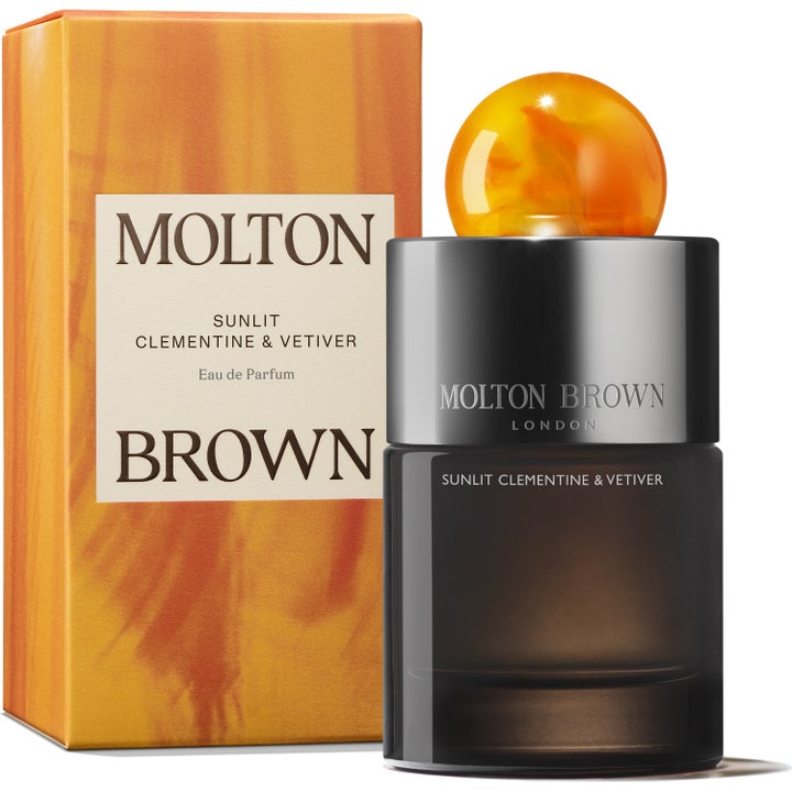 Molton Brown Sunlit Clementine & Vetiver Eau de Parfum 100 ml i mørk glassflaske med oransje kule og eske