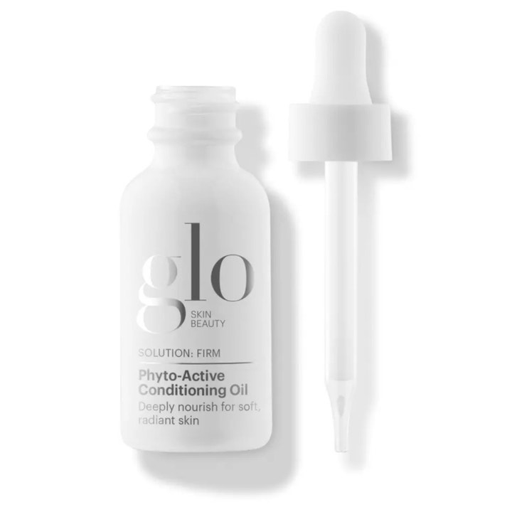 Glo Skin Beauty Phyto-Active Conditioning Oil oppstrammende ansiktsolje i hvit frostet glassflaske med hvit pipette.