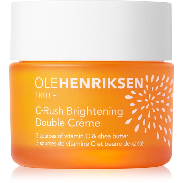 Ole Henriksen Truth C-Rush Brightening Double Crème ansiktskrem som gir glød i oransje krukke med hvitt lokk.