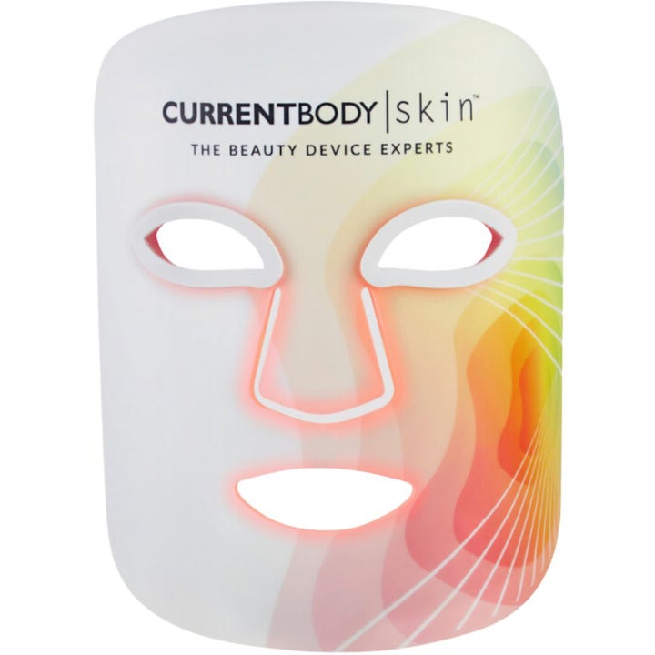 CurrentBody Skin LED Light Therapy Mask 1 stk hudpleieenhet for glød hvit ansiktsmaske med rødt lys og fargerikt mønster