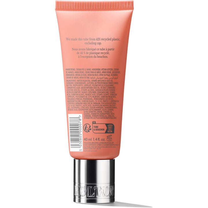 Molton Brown Heavenly Gingerlily Hand Cream 40 ml fuktighetsgivende håndkrem i ferskenfarget tube av resirkulert plast.