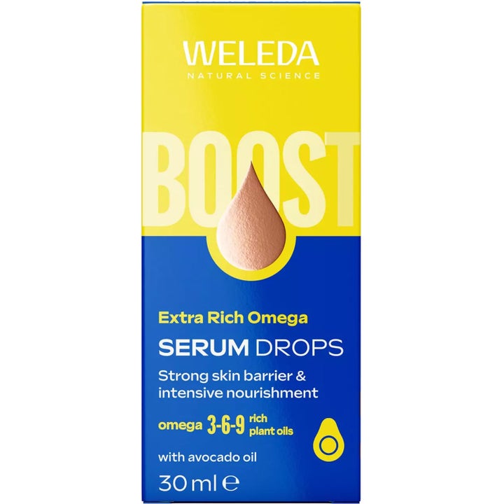 Weleda Extra Rich Omega Serum Drops 30 ml ansiktsserum for sterkere hudbarriere i gul og blå eske med BOOST-tekst.