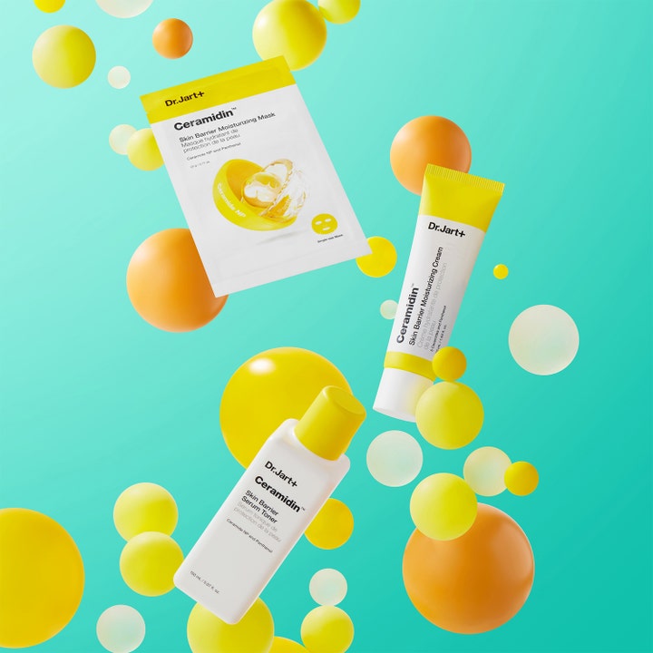 Dr.Jart+ Ceramidin Skin Barrier Moisturizing Cream 15 ml fuktighetskrem vist med maske og toner blant gule og oransje kuler