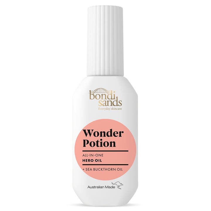 Bondi Sands Wonder Potion Hero Oil ansiktsolje med tindvedolje i hvit flaske med ferskenfarget sirkel og hvit kork.