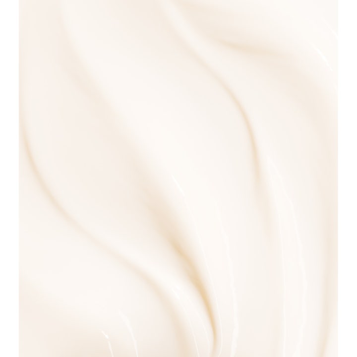 Biotherm Baume Corps Oil Therapy 400 ml fuktighetsgivende bodylotion i en myk kremet ferskenfarget tekstur