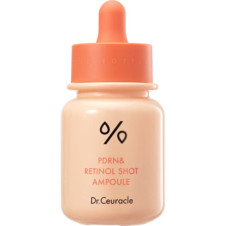 Dr.Ceuracle PDRN & Retinol Shot Ampoule fornyende serum i ferskenfarget glassflaske med oransje pipettekork