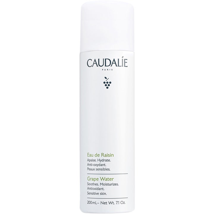 Caudalie Grape Water 200 ml beroligende og fuktighetsgivende ansiktsspray i hvit metallflaske med hvit kork