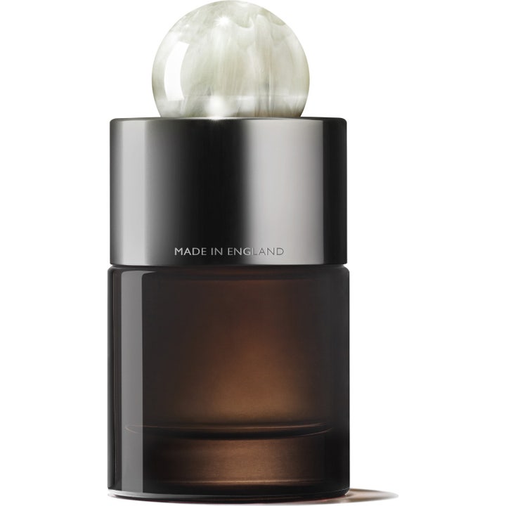 Molton Brown Milk Musk Eau de Parfum 100 ml parfyme i mørk glassflaske med marmorkule ved siden av brun eske
