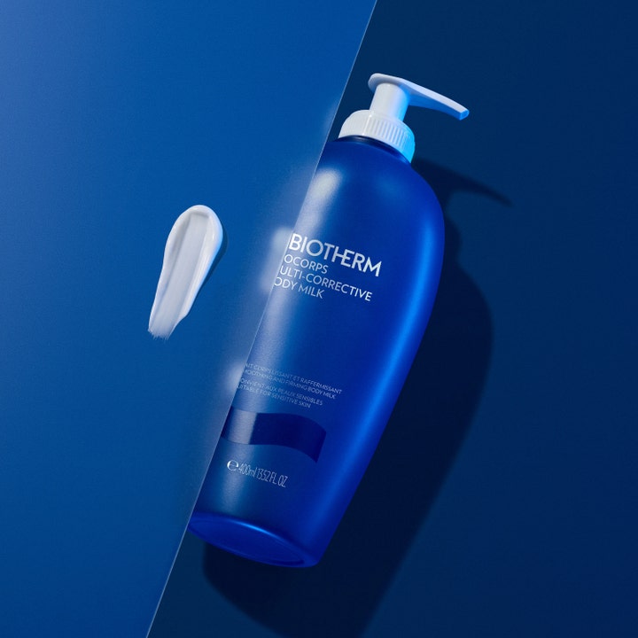 Biotherm Biocorps Multi-Corrective Body Milk 400 ml fuktighetsgivende bodylotion i blå pumpeflaske med kremet tekstur