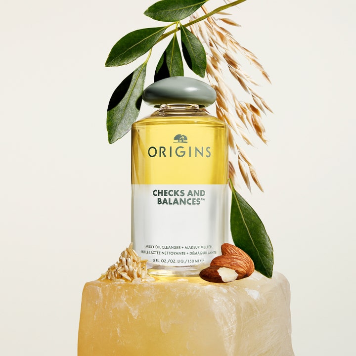 Origins Checks & Balances Milky Oil Cleanser 150 ml to-faset ansiktsrengjøring i glassflaske med mandler