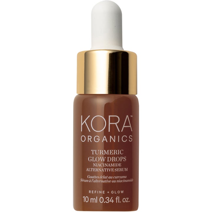 KORA Organics Turmeric Glow Drops 10 ml glødgivende serum med gurkemeie i en brun glassflaske med gullkork