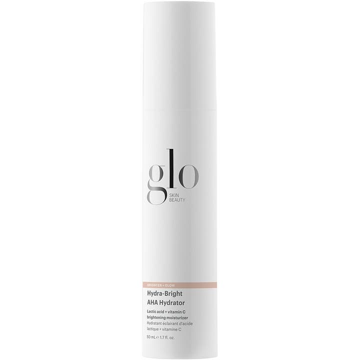Glo Skin Beauty Hydra-Bright AHA Hydrator 50 ml glødgivende ansiktskrem i hvit sylindrisk flaske med sort logo