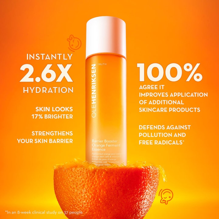 Ole Henriksen Truth Barrier Booster Ferment Essence 118 ml gir fuktighet vist i en oransje flaske i en appelsin.