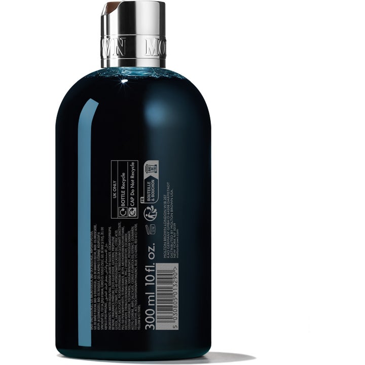 Molton Brown Dark Leather Bath & Shower Gel 300 ml dusjsåpe baksiden av mørk flaske med sølvkork og ingredienser.
