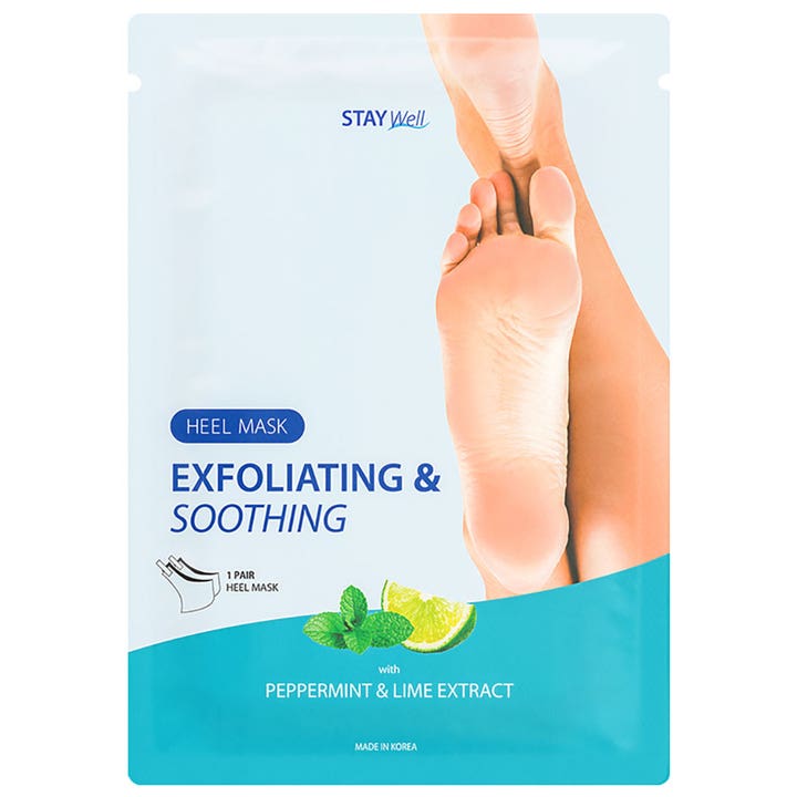 Stay Well Heel Mask 1 par eksfolierende og beroligende fotmaske i lyseblå innpakning med bilde av lime og mynte
