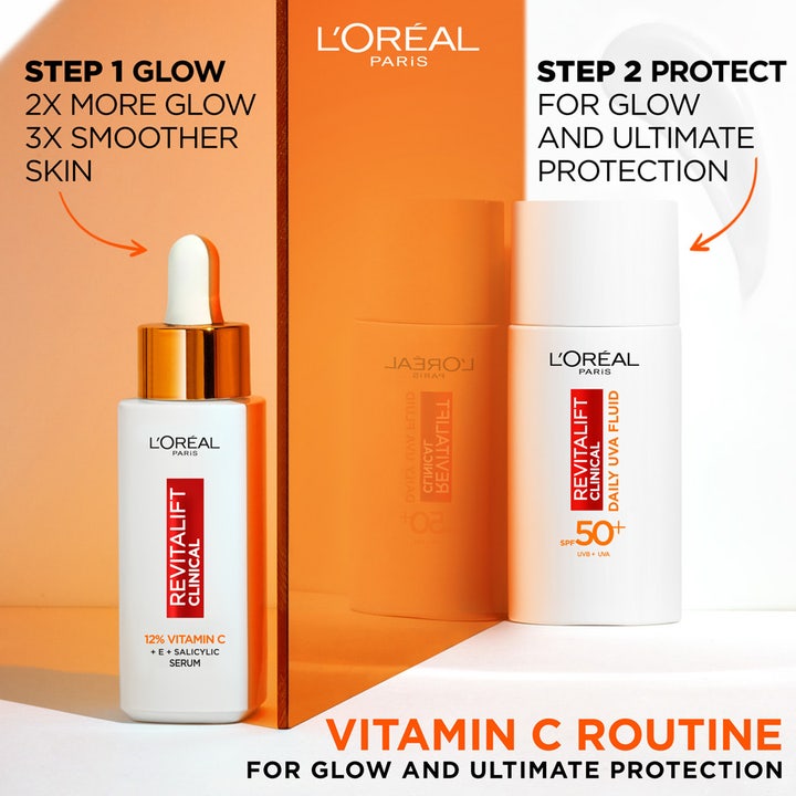 L'Oréal Paris Revitalift Clinical 50 ml solkrem og serum i hvit flaske for glød og beskyttelse med SPF 50.