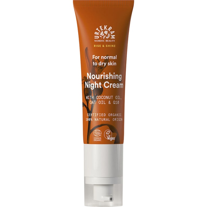 Urtekram Rise & Shine Nourishing Night Cream nærende nattkrem for tørr hud i en oransje tube med hvit pumpe og lokk