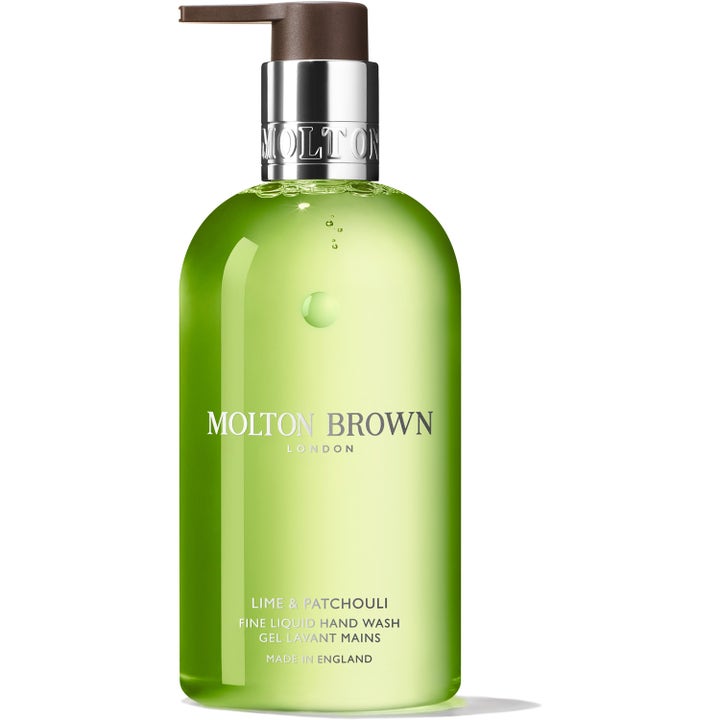 Molton Brown Lime & Patchouli 300 ml oppfriskende håndsåpe i gjennomsiktig flaske med grønn gelé og sølvpumpe