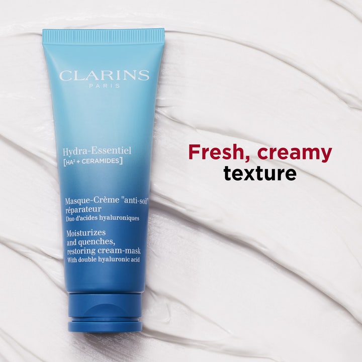 Clarins Hydra-Essentiel Restoring Cream-Mask 75 ml fuktighetsgivende ansiktsmaske med hyaluronsyre på hvit kremet tekstur