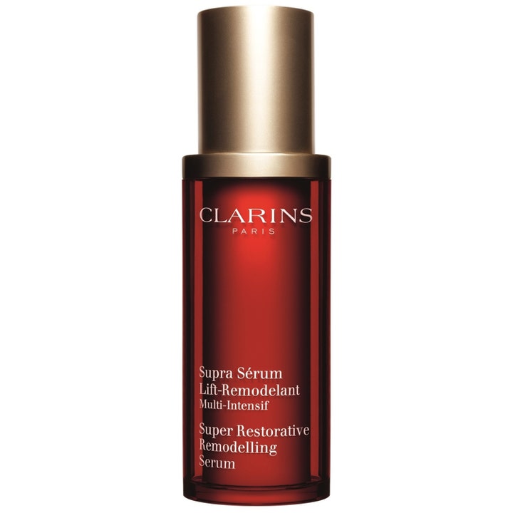 Clarins Super Restorative Remodelling Serum 30 ml som gir løft i en elegant rød glassflaske med gulllokk.