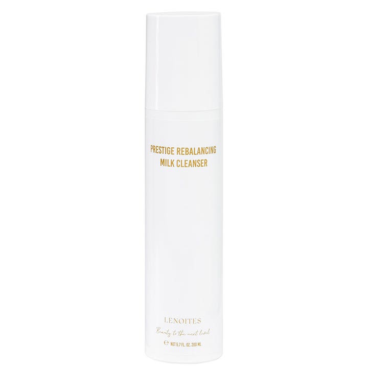 Lenoites Prestige Rebalancing Milk Cleanser 200 ml ansiktsrens i hvit pumpeflaske med gullskrift.