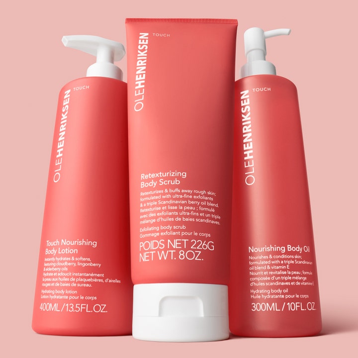 Ole Henriksen TOUCH Nourishing Body Oil 300 ml fuktighetsgivende kroppsolje i korallfarget flaske med hvit pumpe