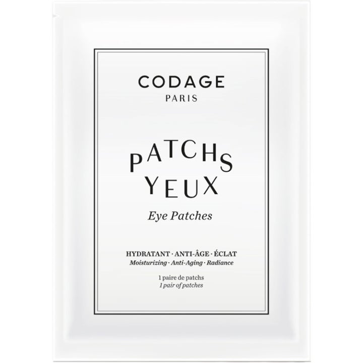 Codage Eye Patches 1 par fuktighetsgivende øyemasker gir glød i en hvit sachet med minimalistisk sort tekst.
