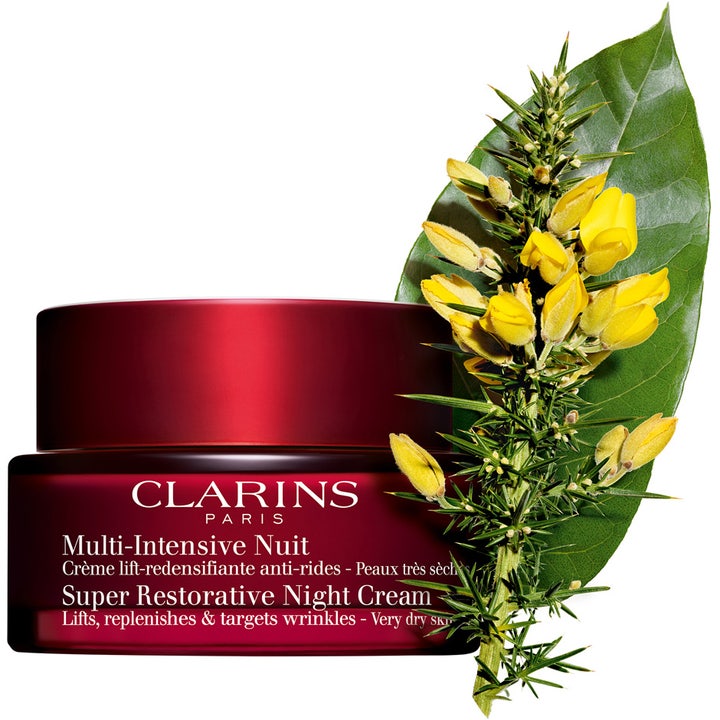 Clarins Super Restorative Night Cream 50 ml nattkrem som motvirker rynker i rød krukke med gule blomster