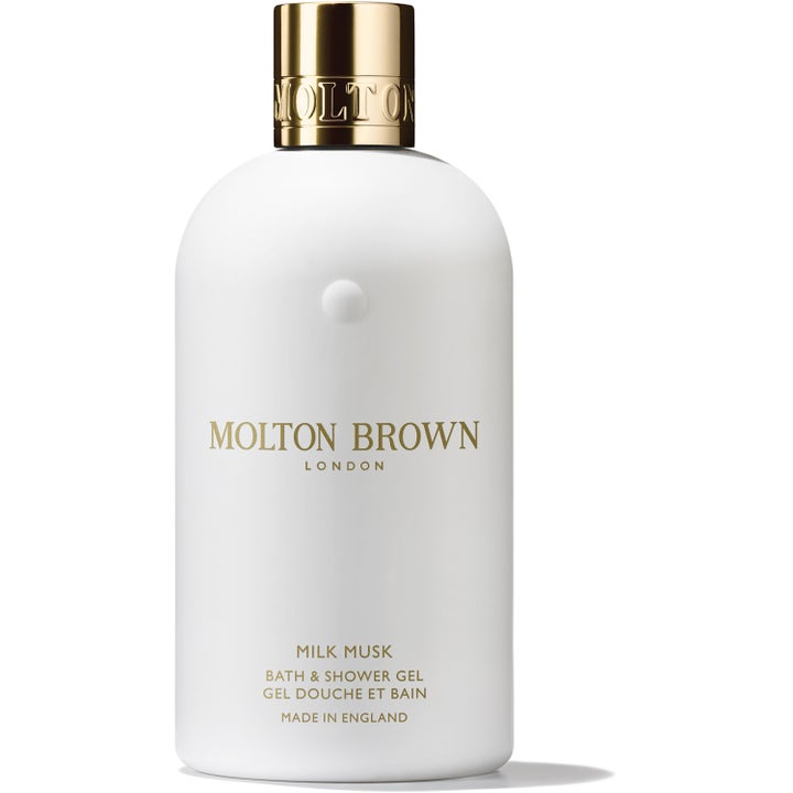 Molton Brown Milk Musk Bath & Shower Gel 300 ml pleiende dusjsåpe i hvit flaske med elegant gullkork.