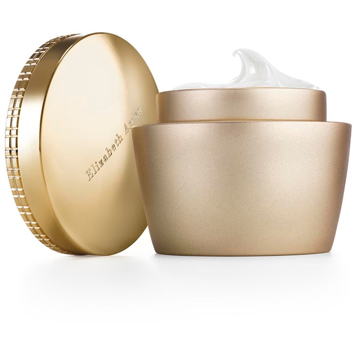 Elizabeth Arden Ceramide oppstrammende ansiktskrem i elegant gullkrukke med hvit kremet tekstur og matchende gulllokk.