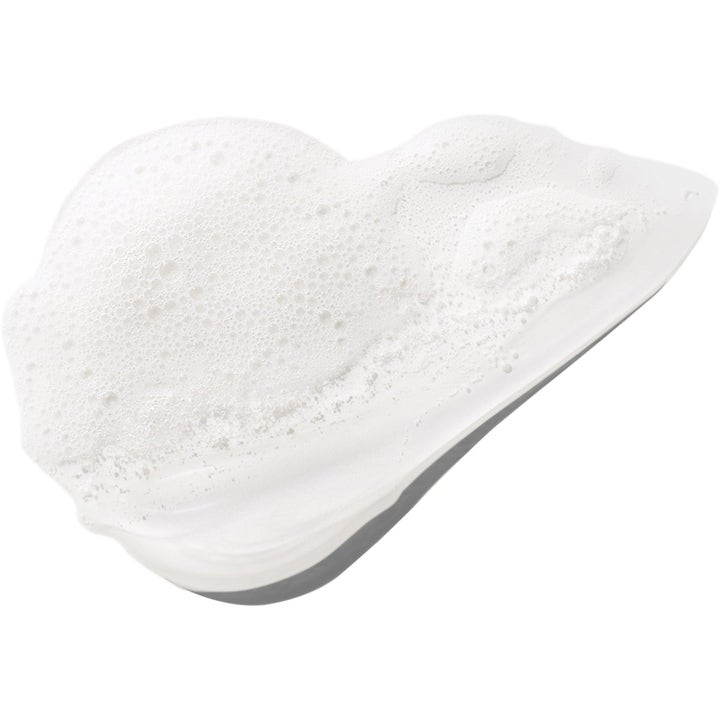 Clinique 3-Step Skincare System 450 ml hudpleiesett med ansiktssåpe, lotion og fuktighetskrem mot glitrende lilla bakgrunn
