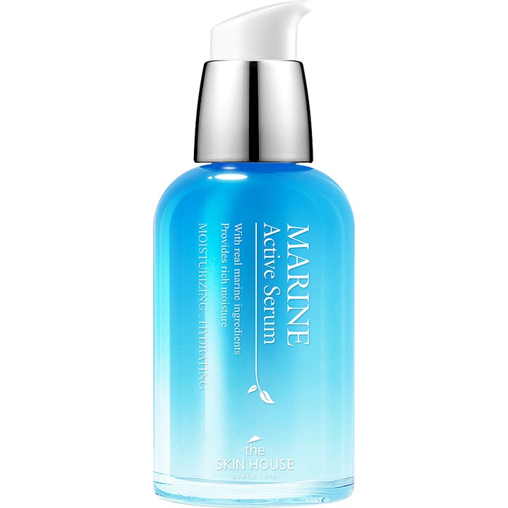 The Skin House Marine Active Serum fuktighetsgivende ansiktsserum i blå gradient glassflaske med hvit pumpe og sølvdetaljer.