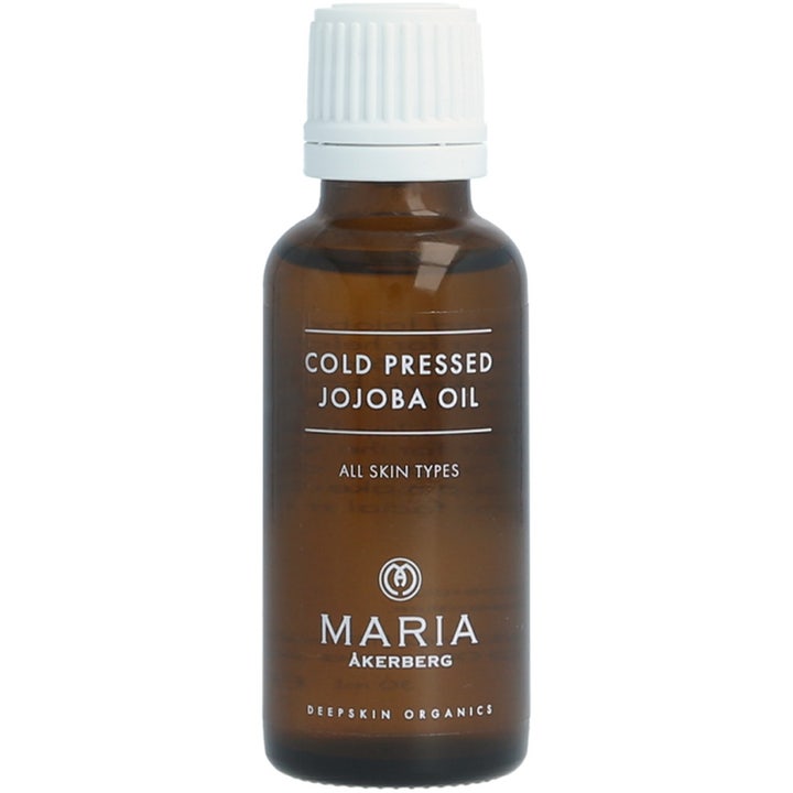 Maria Åkerberg Cold Pressed Jojoba Oil fuktighetsgivende ansiktsolje i en brun glassflaske med hvit skrukork