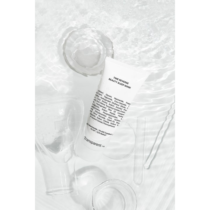 Transparent Lab Time Reverse Beauty Sleep Mask 75 ml nattmaske i hvit tube nedsenket i vann med bobler