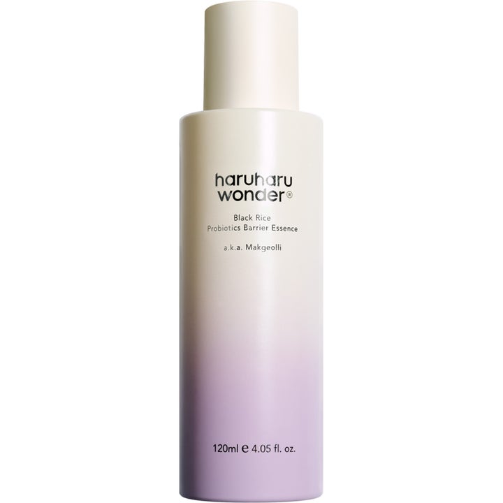 Haruharu Wonder Black Rice Probiotics Barrier Essence 120ml styrkende essence i sylindrisk flaske med lilla gradient.