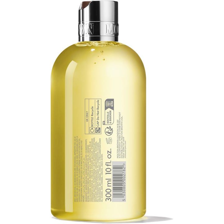 Molton Brown Orange & Bergamot Bath & Shower Gel 300 ml oppfriskende dusjsåpe baksiden av flaske med etikett og sølvkork
